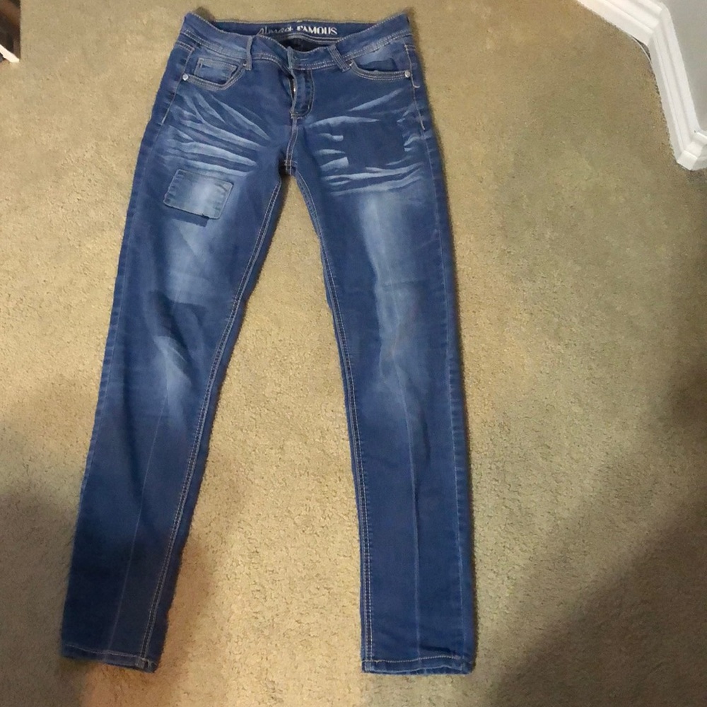 Patchy faded juniors jeans